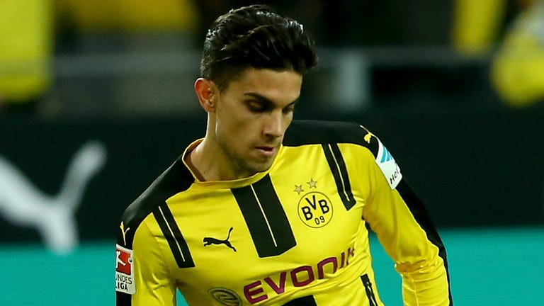 borussia dortmund players struggle with bomb attack