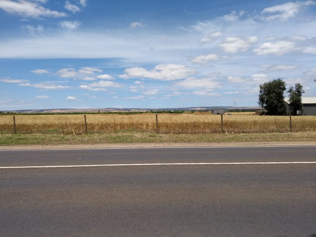 Walking to Angle Vale, Adelaide hills away to the East.