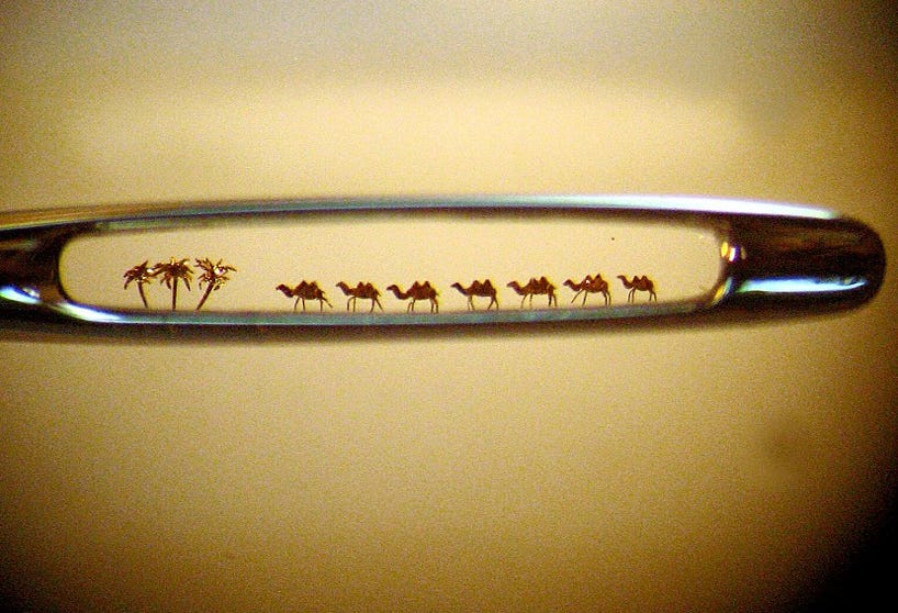 sculptures so small they fit in the eye of a needle by nikolai aldunin