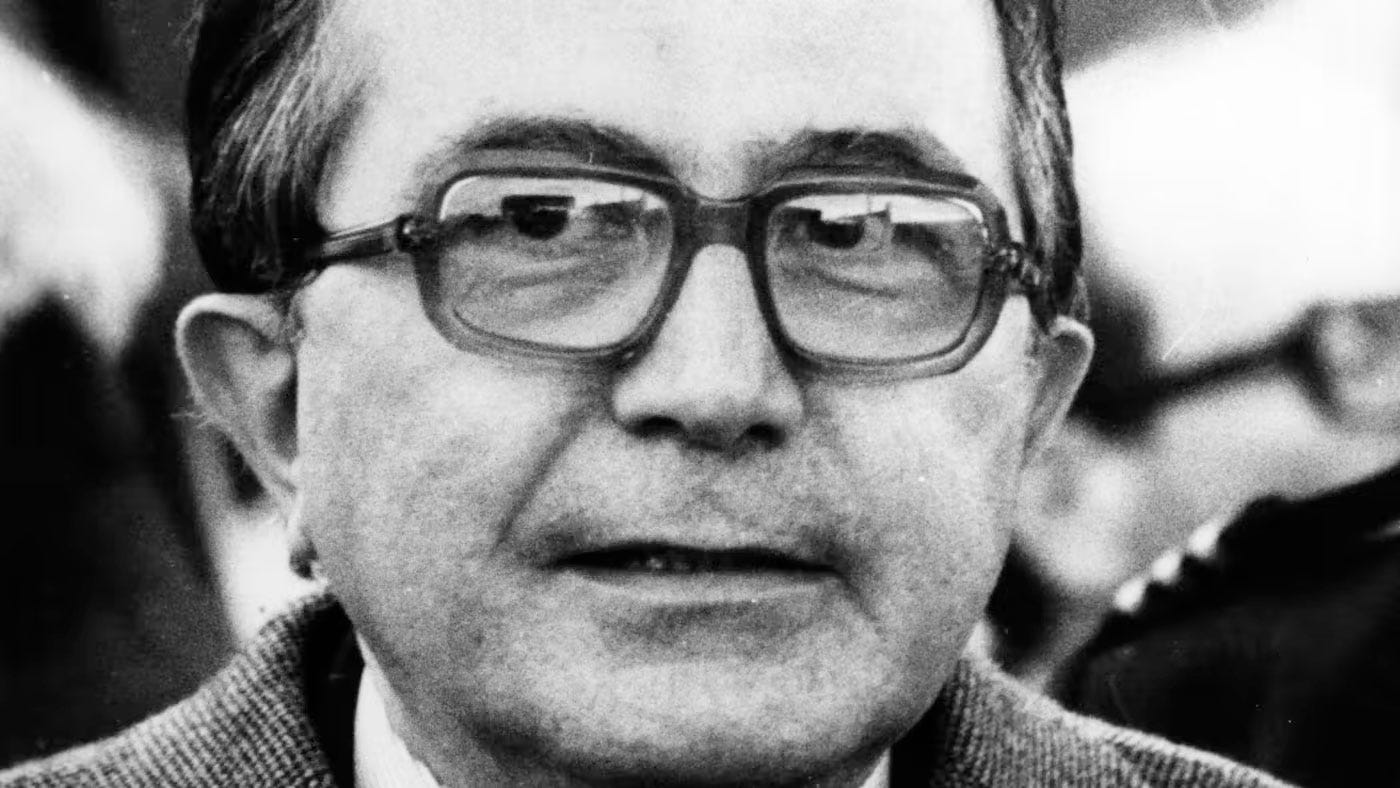 Big close-up of Italian statesman Giulio Andreotti in his characteristic thick-rimmed glasses