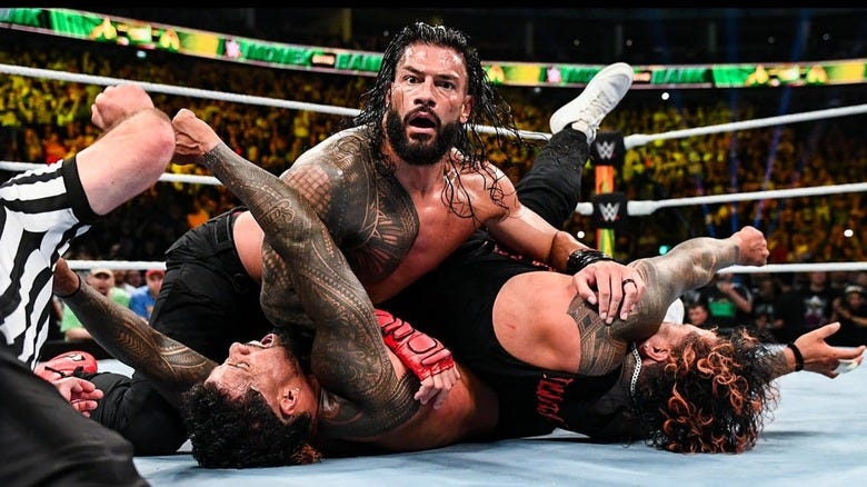 Roman Reigns Looks Stunned At WWE MITB