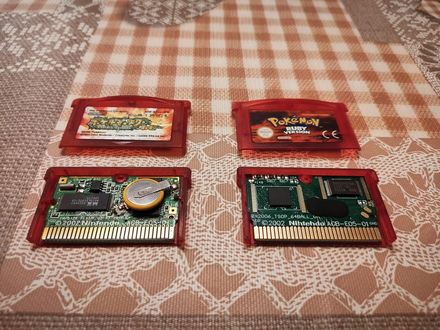 Copies of Pokémon Ruby. Left side is a genuine Japanese cartridge, right side is a reproduction (Photo credit: Lucent)