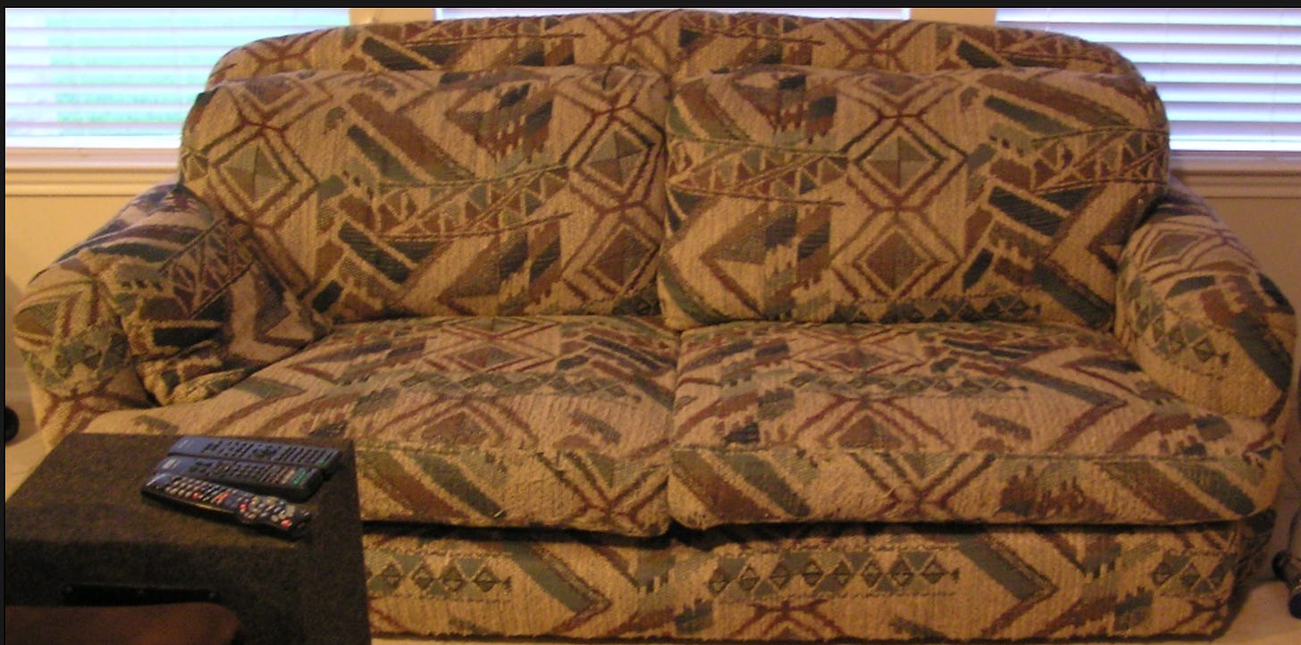 Brown and ugly patterns on a big old sofa