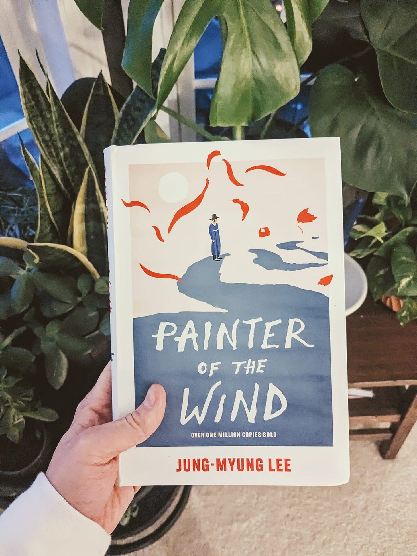 May be an image of text that says 'PAINTER OF THE WIND OVER ONE MILLION COPIES SOLD JUNG-MYUNG LEE'