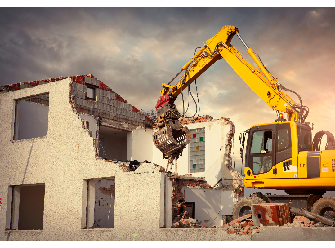 Image of a house being demolished.
