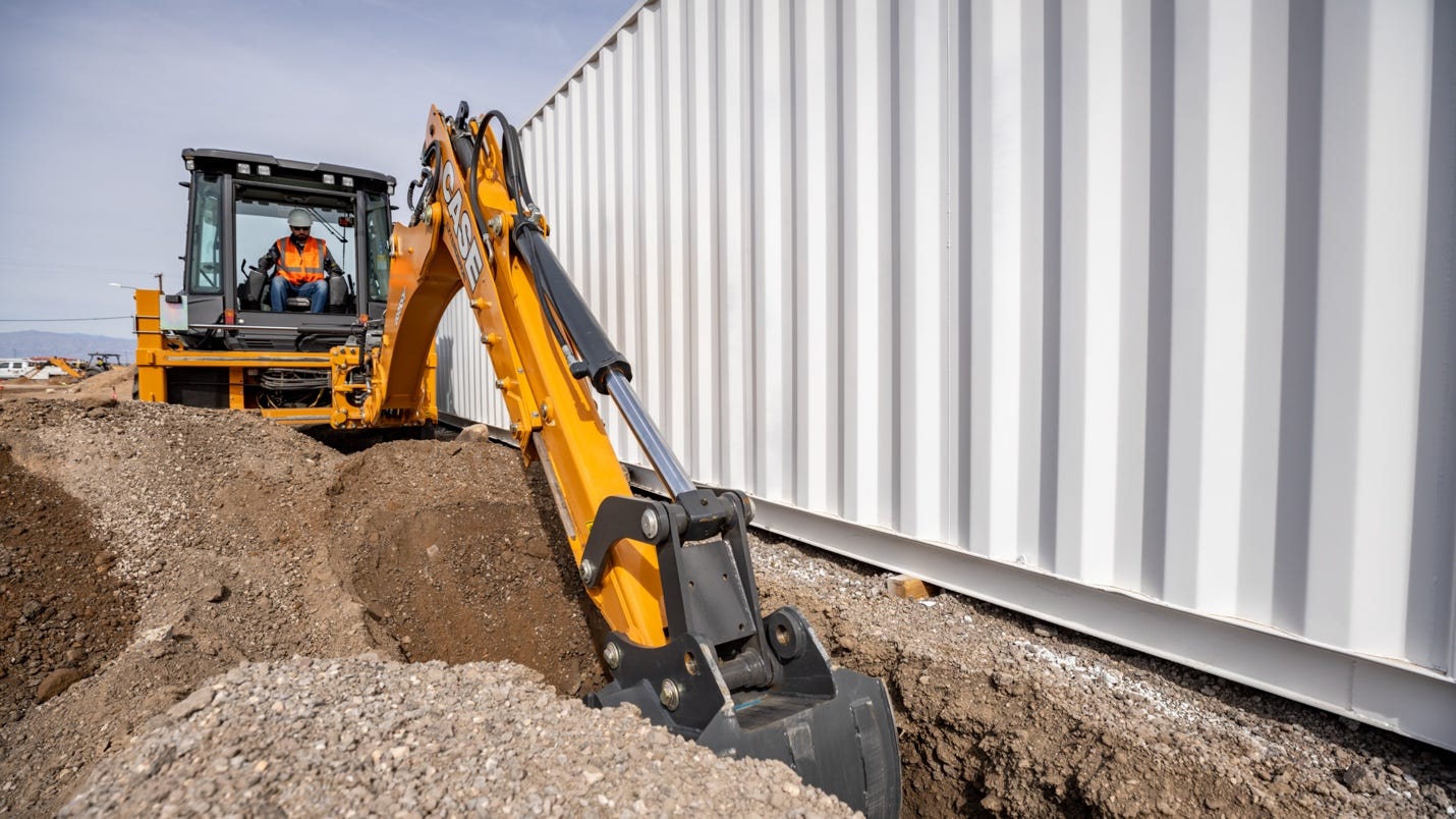 A picture containing outdoor, ground, transport, power shovel

Description automatically generated
