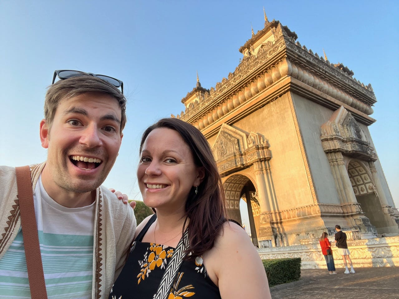 The two of us standing in front of Vientiane’s Victory Gate