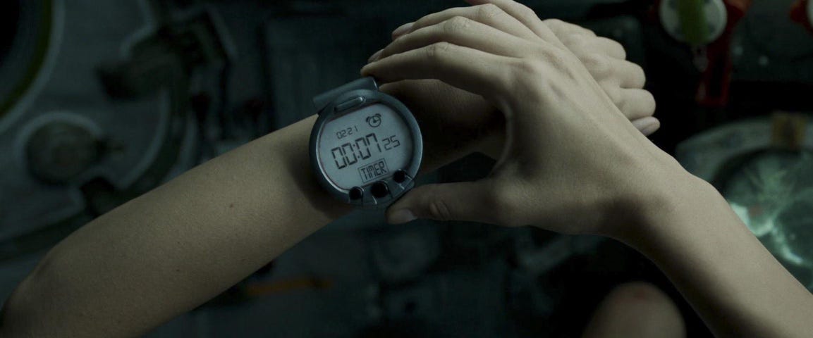 Gravity: Close-up. Setting a timer on a wristwatch.