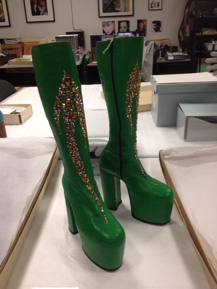 Kelly green knee-high platform boots bedazzled with sequins