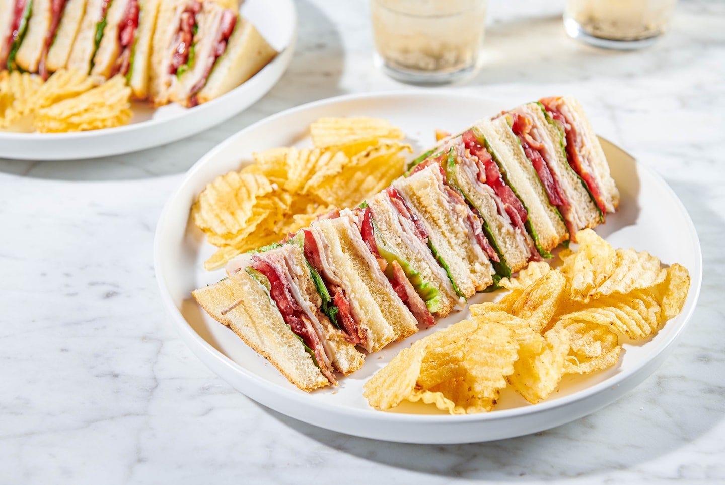 Diner-Style Club Sandwich on a table in a Studio