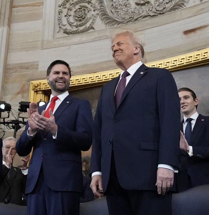 Donald Trump, right, and JD Vance, left, on stage before taking their oaths of office during the Inauguration ceremonies in the Rotunda of the U.S. Capitol in Washington on Monday, Jan. 20, 2025. 