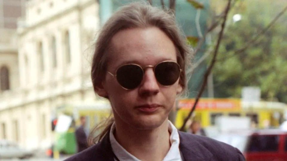 Julian Assange leaves a Melbourne court after facing charges of computer hacking in 1995. - Ian Kenins/The AGE/Fairfax Media/Getty Images