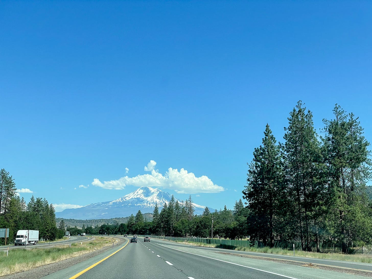 road through California, with view of Mt Shasta