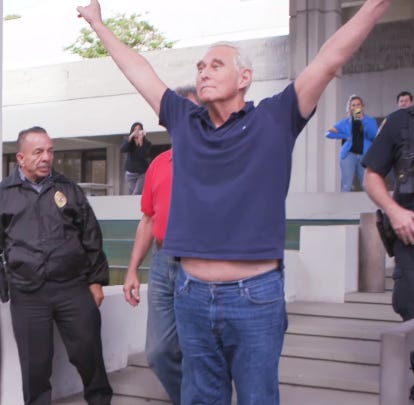 File:Roger Stone making the V sign after his arrest and indictment.png