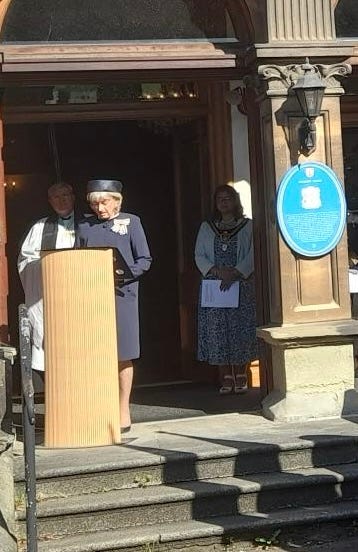 THE LORD LIEUTENANT OF SOUTH GLAMORGAN, MRS MORFUDD MEREDITH GIVING READING.