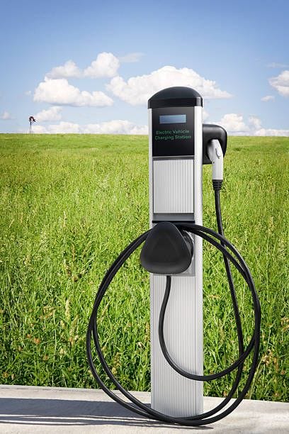 electric vehicle charging station - electric vehicle charging station stock pictures, royalty-free photos & images