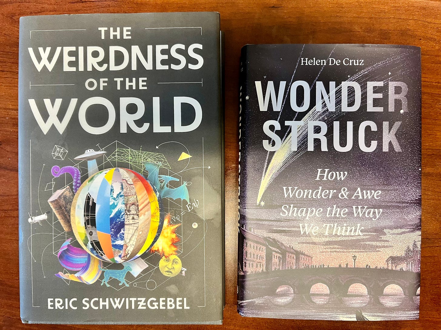 Books covers of The Weirdness of the World by Eric Schwitzgebel and Wonderstruck by Helen De Cruz