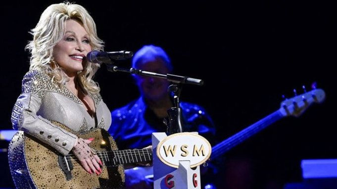 Dolly Parton is bringing us Christmas cheer. Twice.