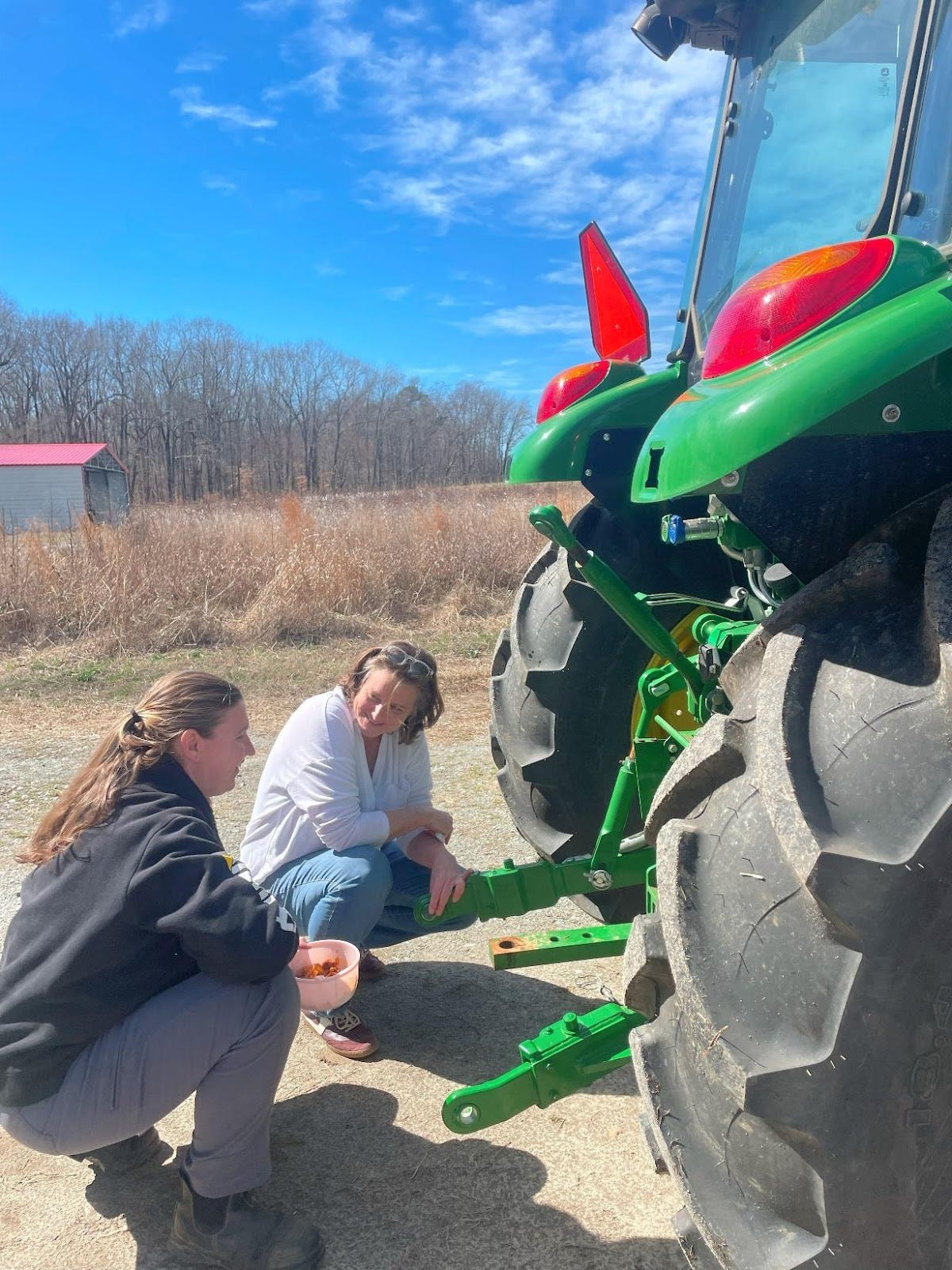 A couple of women looking at a tractor
AI-generated content may be incorrect. A couple of women looking at a tractor
AI-generated content may be incorrect.