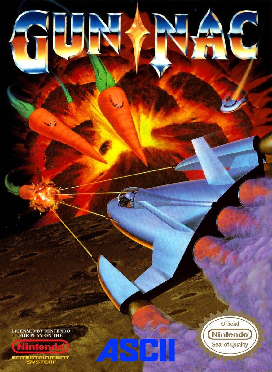 The North American box art for Gun-Nac, featuring your ship (in its wing form) attacking a squadron of carrot ships.