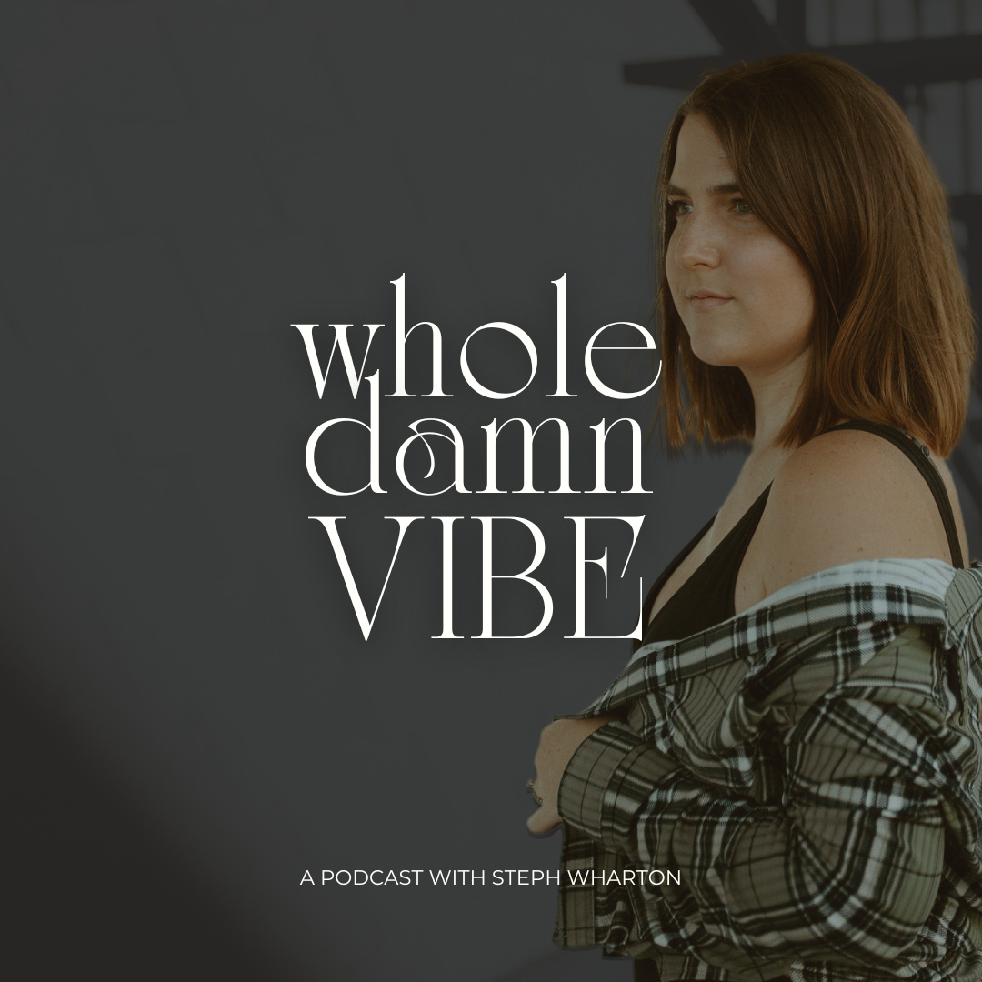 Steph Wharton stands near an outdoor stairway looking off to the left, her flannel shirt off her shoulders. There is a grey overlay on the photo and the text "whole damn vibe" positioned in the middle.