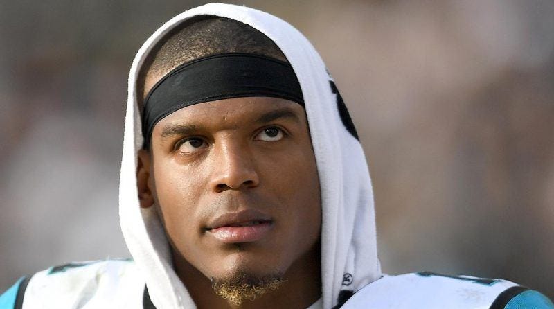 cam newton holds up for carolina panthers mttg