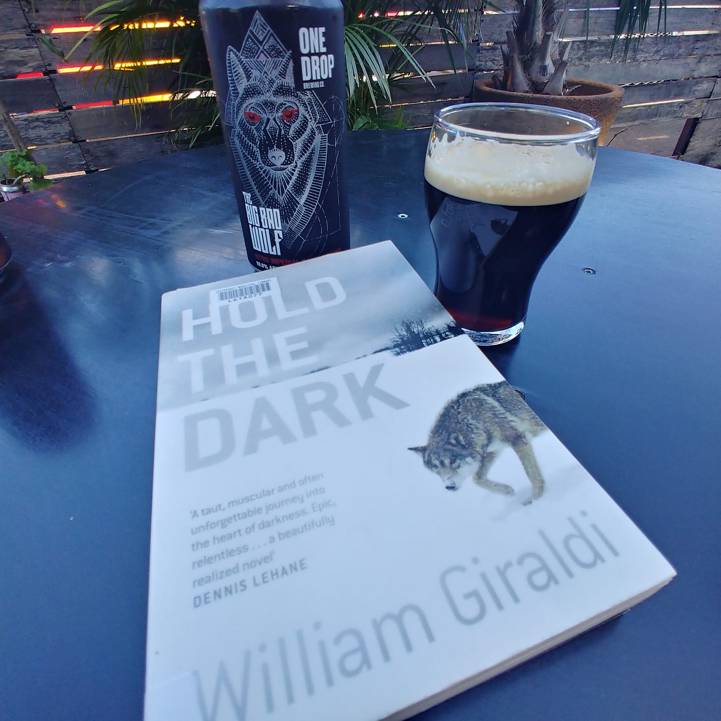 Hold the Dark by William Giraldi, and One Drop Brewing Co's The Big Bad Wolf