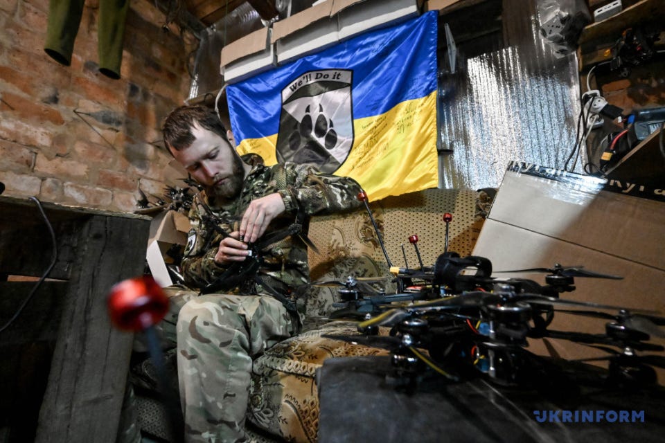 A fighter of a company of strike UAV systems adjusts FPV drones / Photo: Dmytro Smolienko. Ukrinform