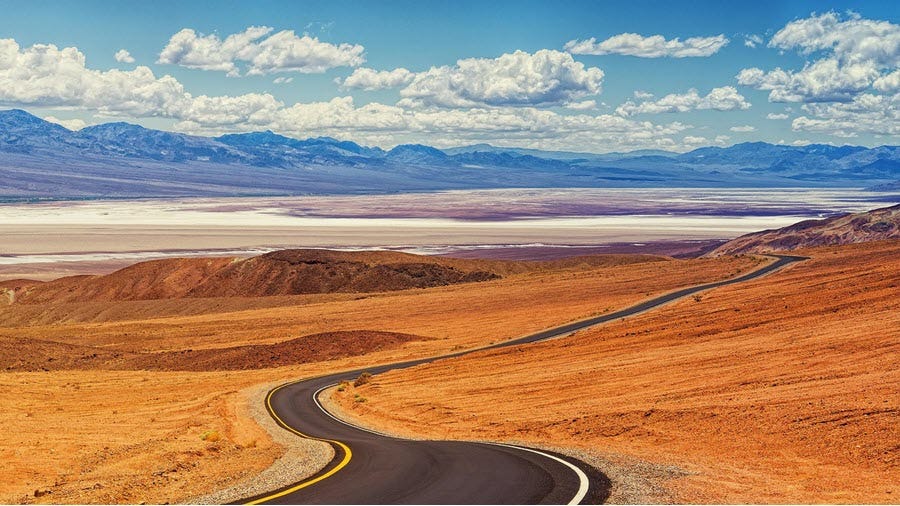 Road winding in desert