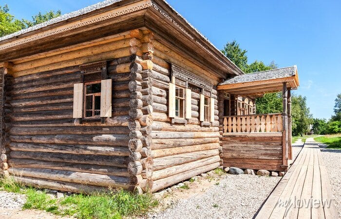Traditional russian old wooden house in the village • wall stickers wooden,  wood, window | myloview.com