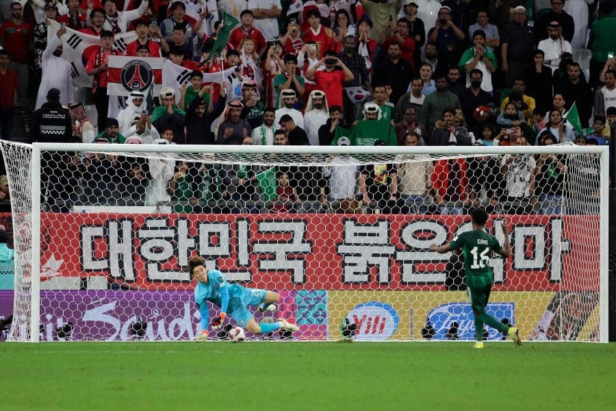 South Korea's goalkeeper Jo Hyeon-woo saves the third penalty goal by Saudi Arabia's midfielder  Sami al-Najei during penalty shootout in the Qatar 2023 AFC Asian Cup football match between Saudi Arabia and South Korea at Education City Stadium in al-Rayyan, west of Doha. - AFP pic