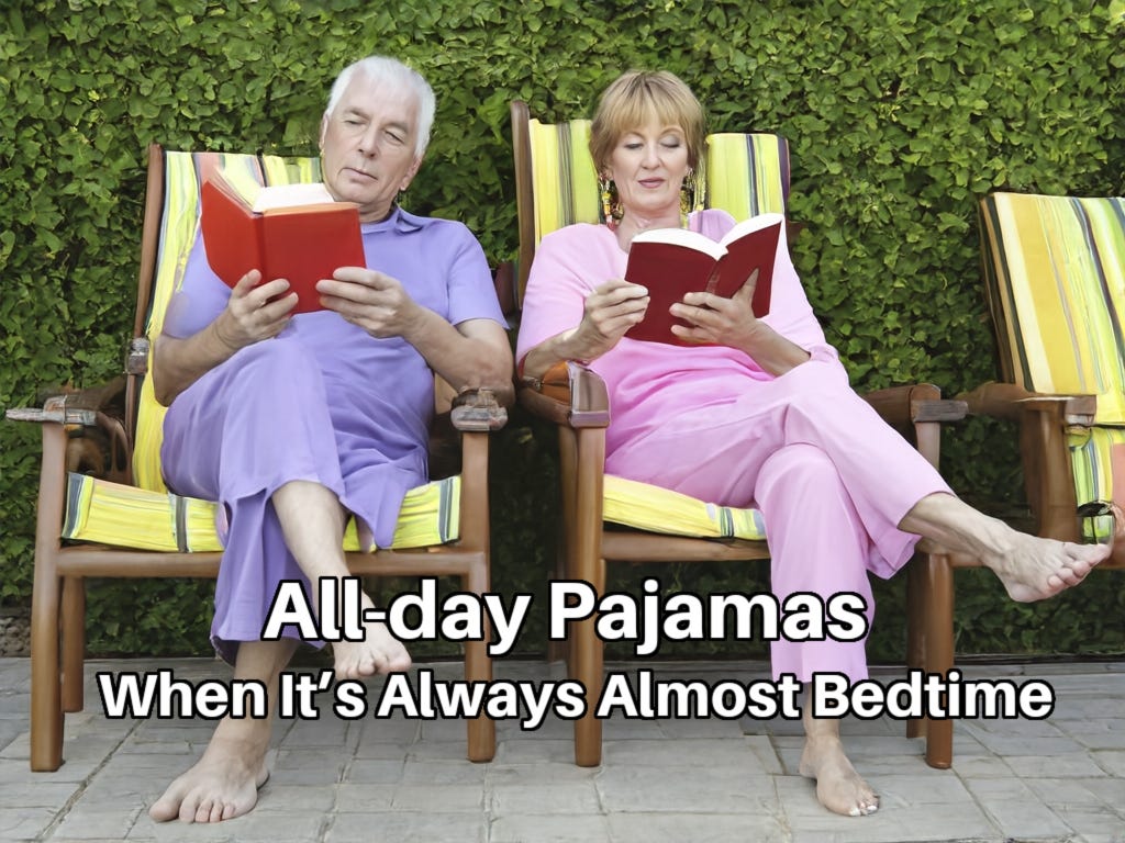 An older couple, barefooted and wearing pajamas, sit in deck chairs, each reading a book. Inside caption: “All-day Pajamas – When It’s Always Almost Bedtime.”