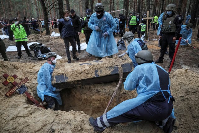 Ukraine says some bodies found in mass burial site had been bound - The  Jerusalem Post