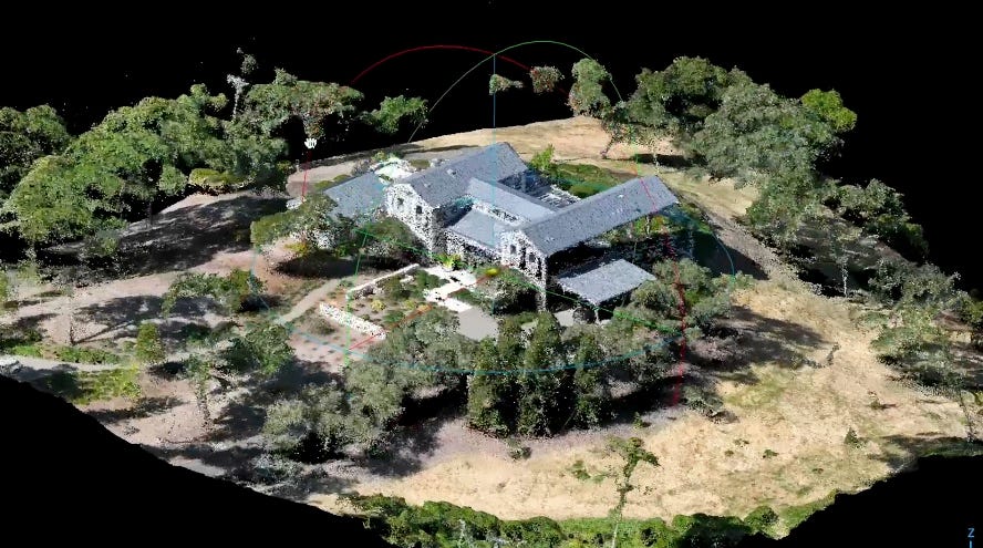 3D rendering of a house surrounded by trees on uneven terrain, with visible topography and vegetation.