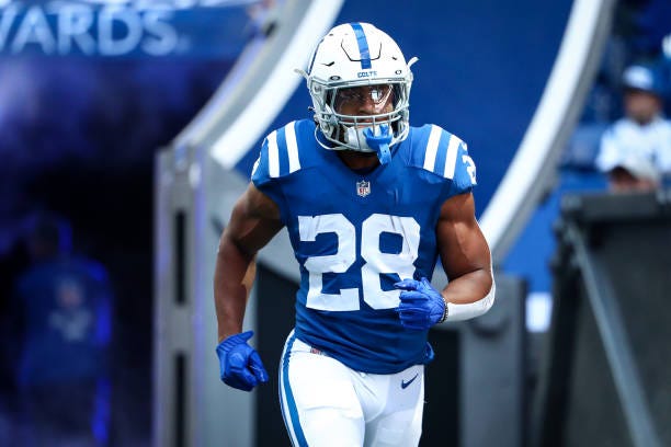 Jonathan Taylor of the Indianapolis Colts runs out of the tunnel prior to an NFL game against the Houston Texans at Lucas Oil Stadium on October 17,...