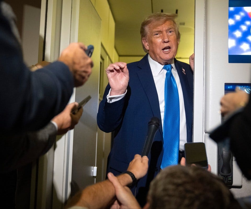President Donald Trump speaking to reporters on Air Force One.