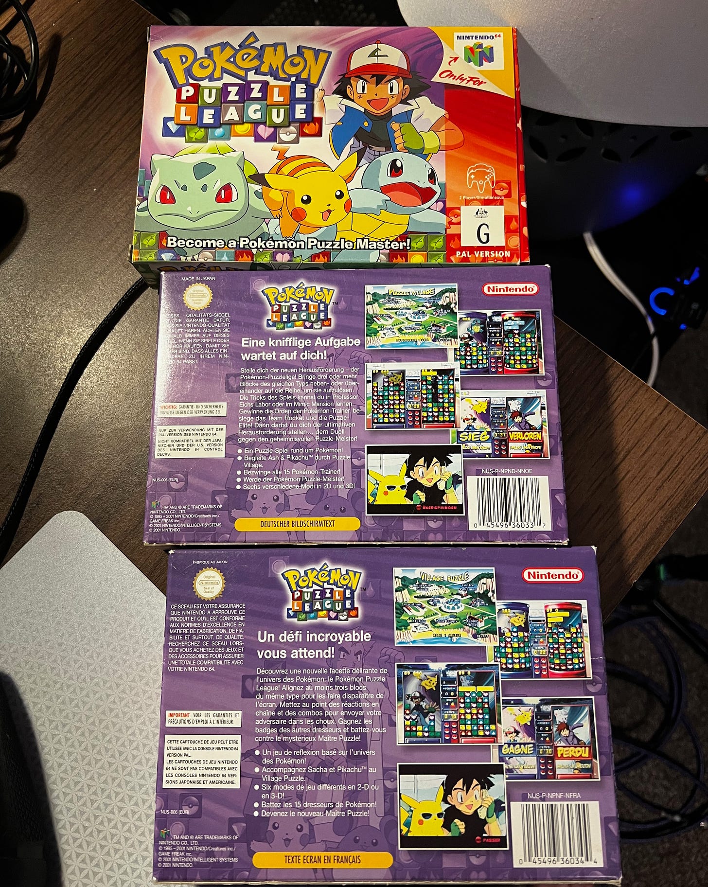 Three physical PAL copes of Pokémon Puzzle League that Lawrence has from the development of the game