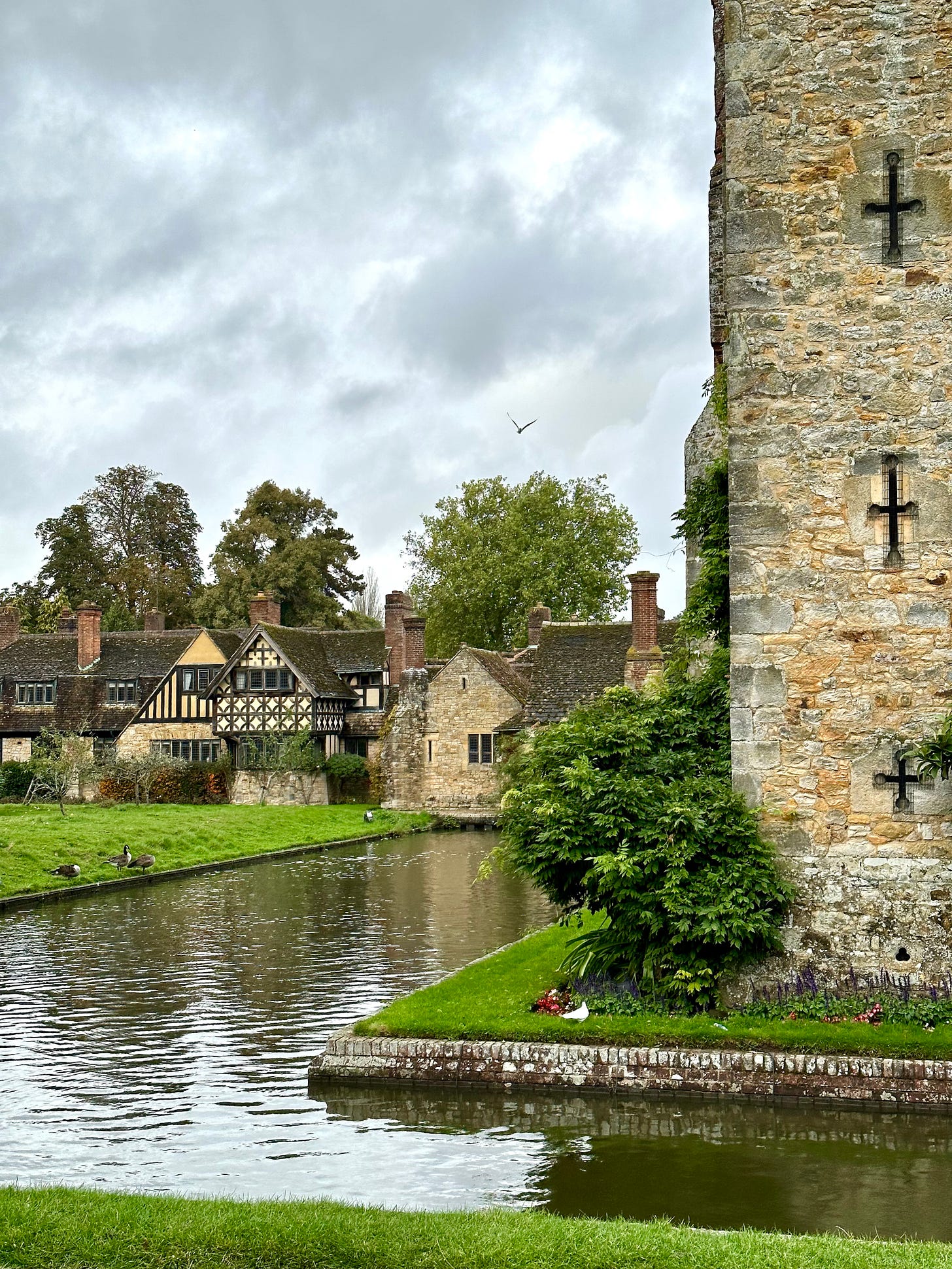Hever castle and moat, with doves and gardens