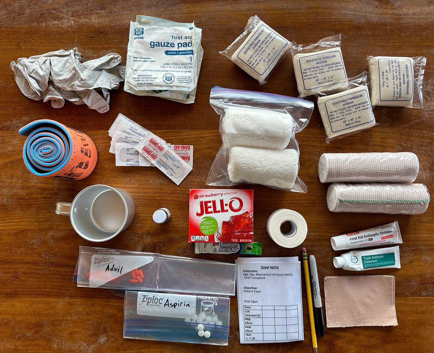 All of the components of Jesse McEntee's med kit laid out on a table