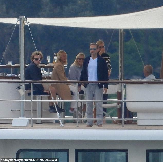 Fun times: Media baron Lachlan Murdoch and his model wife Sarah cruised around Sydney Harbour on their new $30million superyacht on Saturday