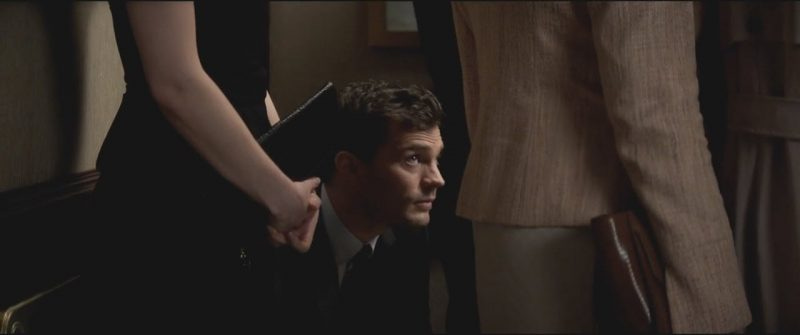 fifty shades darker jamie dornan on knees elevator