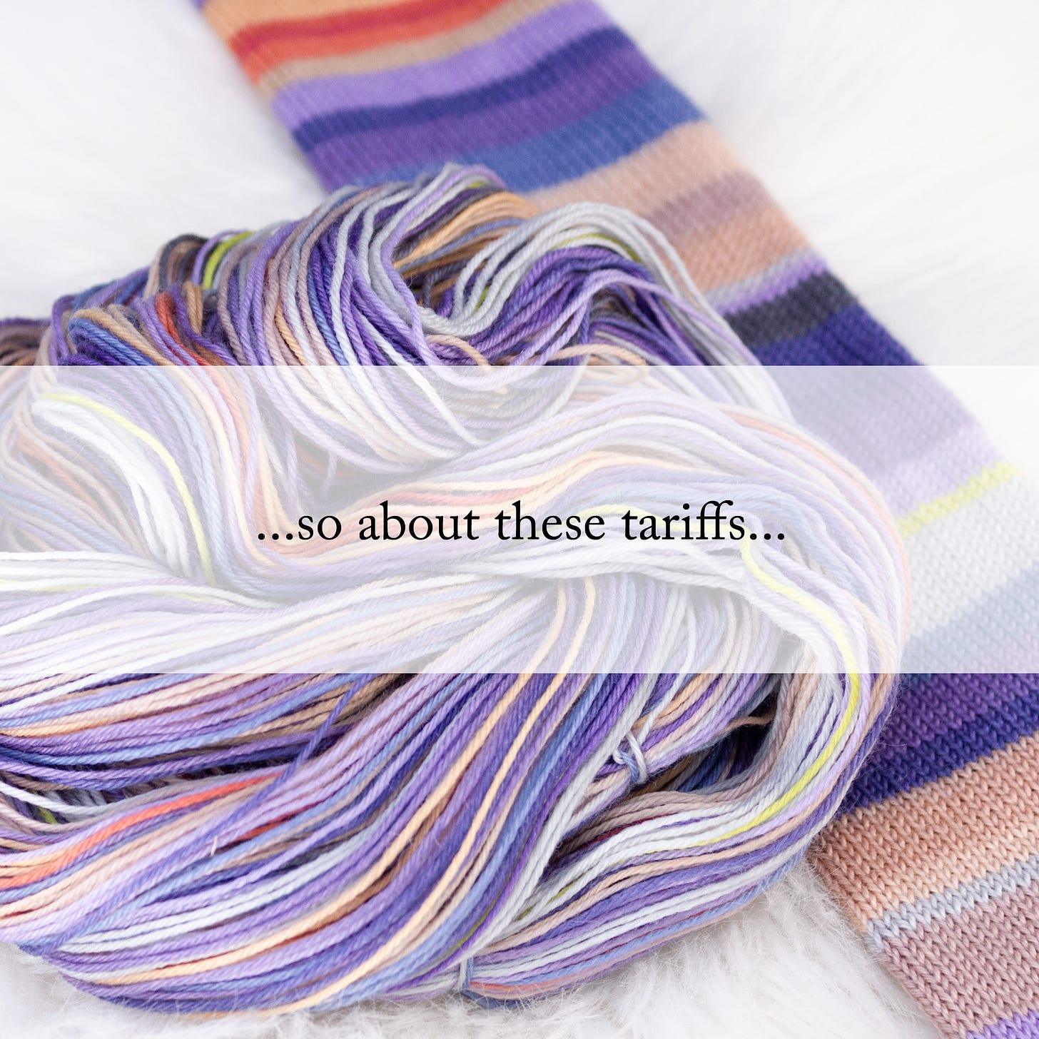 Some lovely grey-and-beige striped yarn in the background with text that reads “…so about these tariffs…”