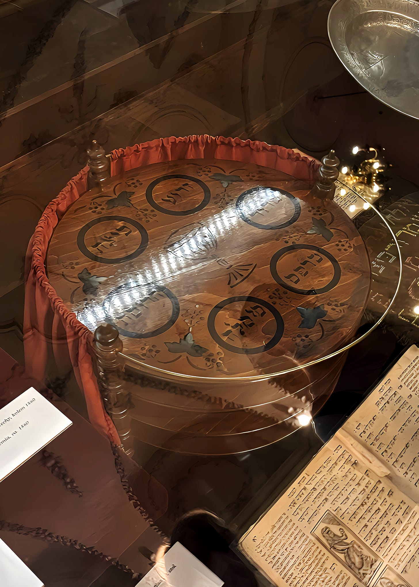 A seder plate and matzah stand from the permanent collection at Klausen Synagogue in Prague