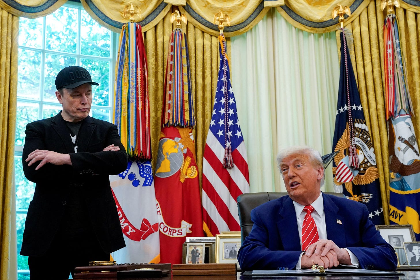 From 'disgusting abomination' to 'crazy:' Trump and Musk in social media  brawl | Reuters