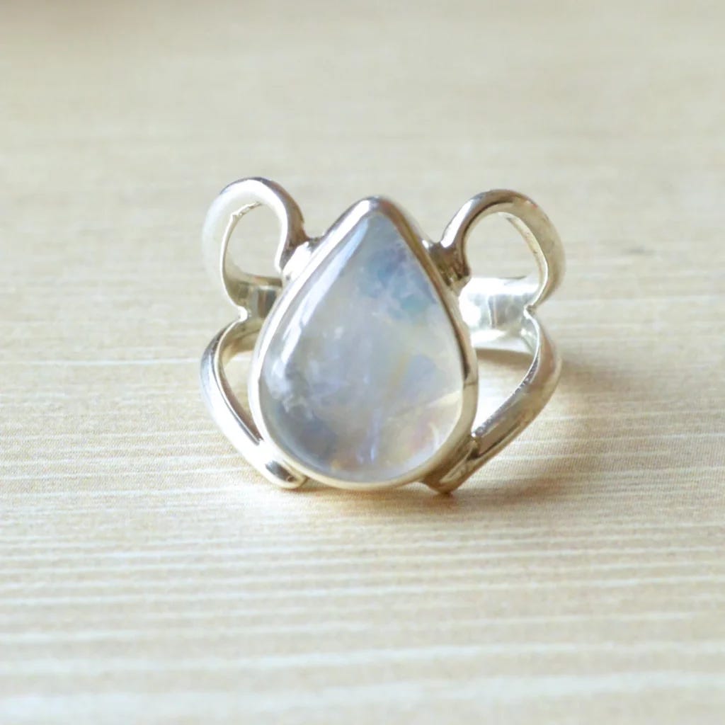 A moody moonstone ring fits the dreamy summer zodiac sign vibe