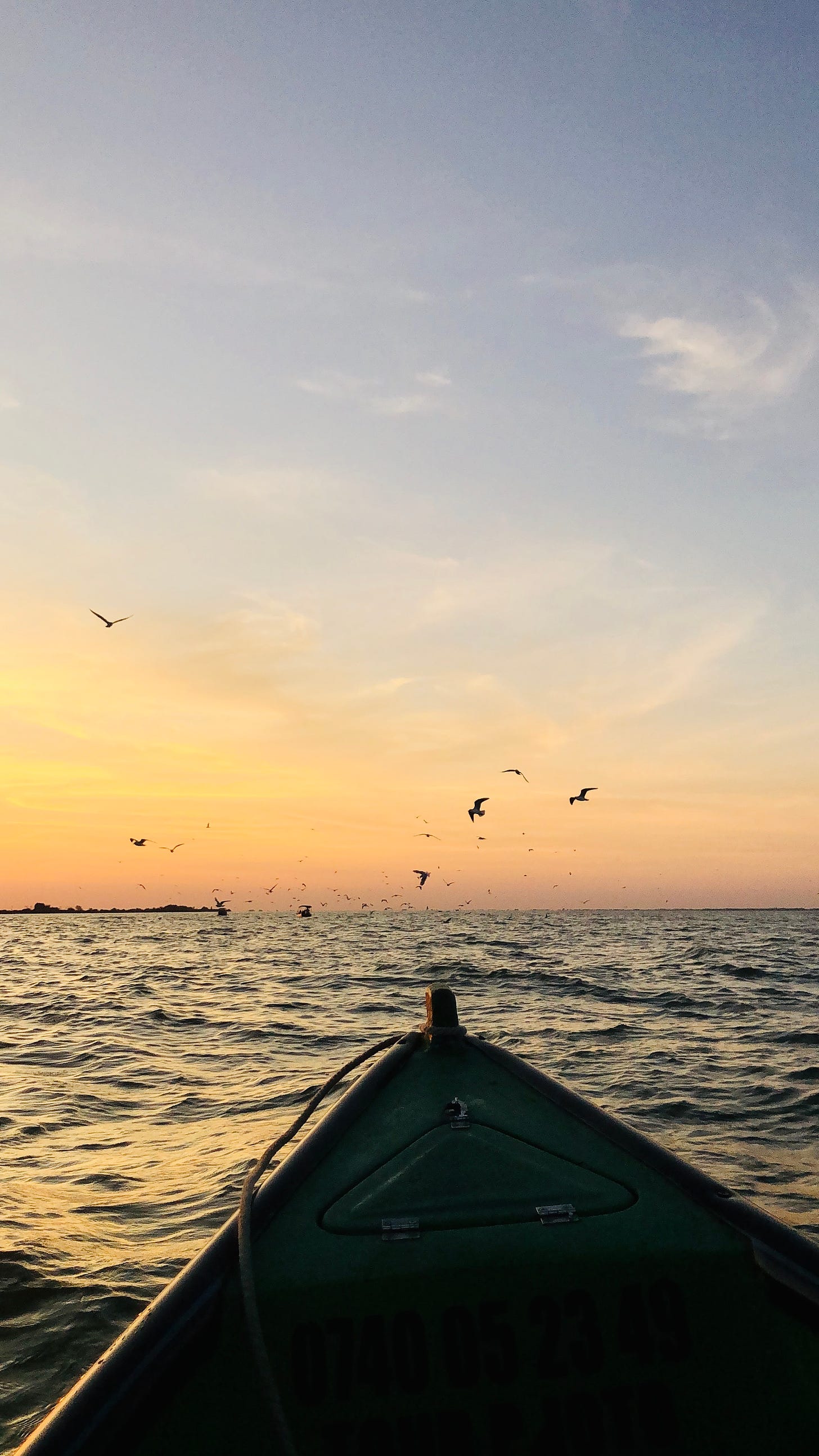 Apus de soare la Sulina, la vărsarea brațului Sulina în mare. Foto: Nicoleta Felea