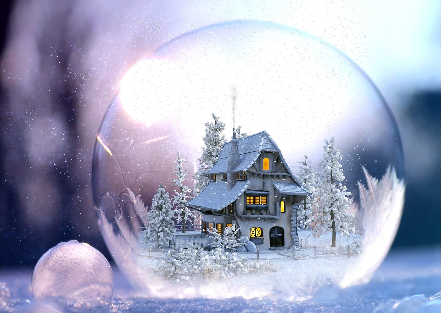 Wintry scene with house and snow-covered trees in a snow globe