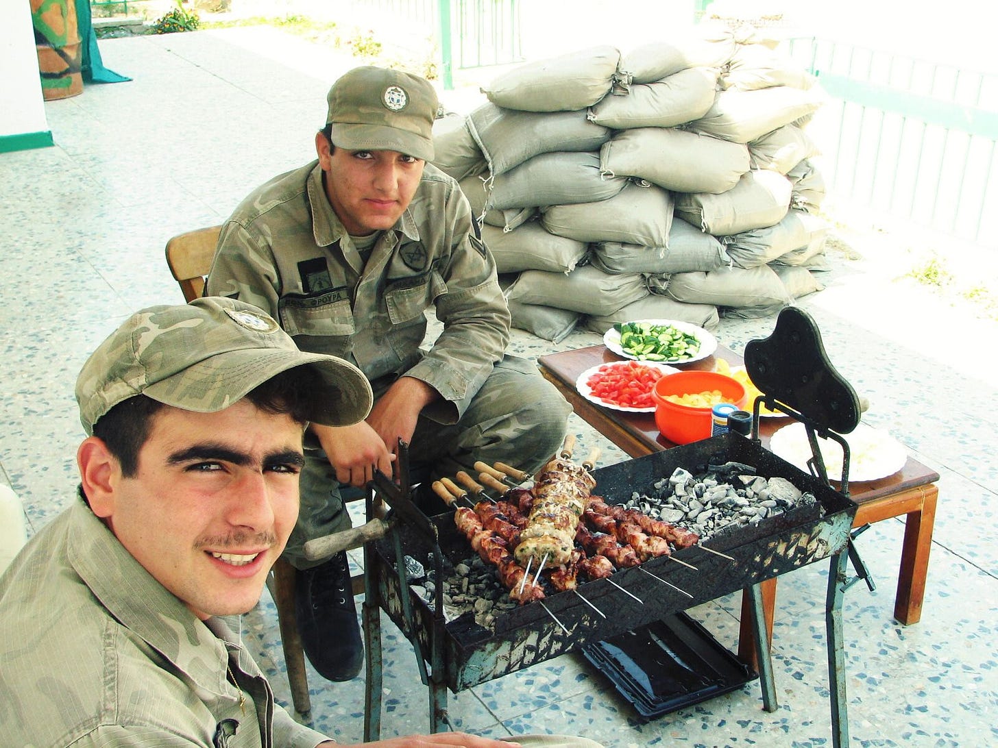 Greek Cypriot conscripts at outpost grilling kebabs