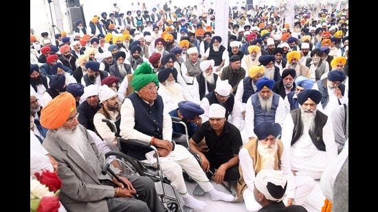 INLD supremo Om Prakash Chautala, senior Akali leader Sukhdev Singh Dhindsa and others attend a meeting organised to commemorate the first death anniversary of former Punjab chief minister Parkash Singh Badal, at Badal village in Muktsar on Sunday. (PTI)