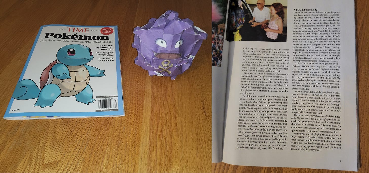 A photograph featuring a copy of Time magazine from 2024, and a paper mache Koffing, the mascot of Smogon